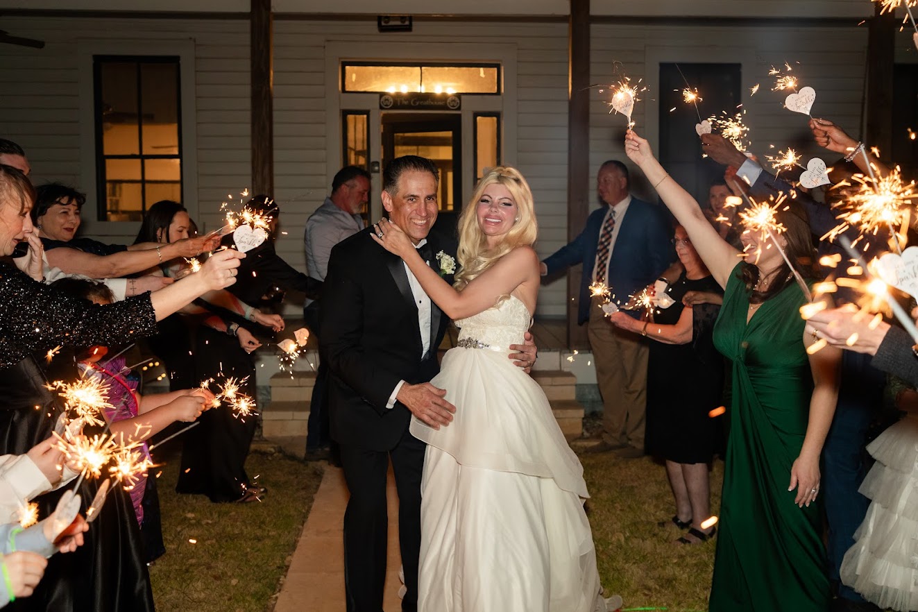 Lee and Lauren sparkler exit at Willow Sky Ranch — Texas Hill Country wedding venue
